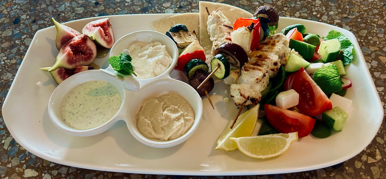 Chicken & Vegetable skewers with salad and pita bread