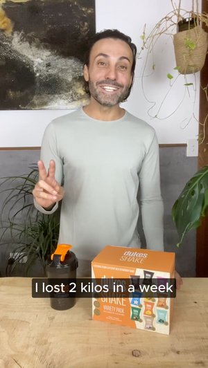 man drinking weight loss shake