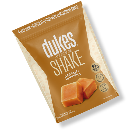 A bag of Dukes Weight Loss Caramel Shake oriented diagonally